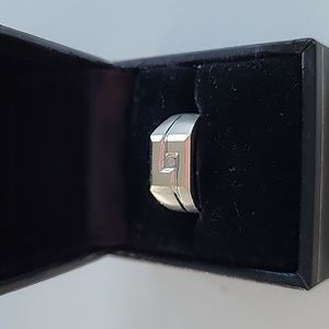 Mens 10K white gold diamond ring.